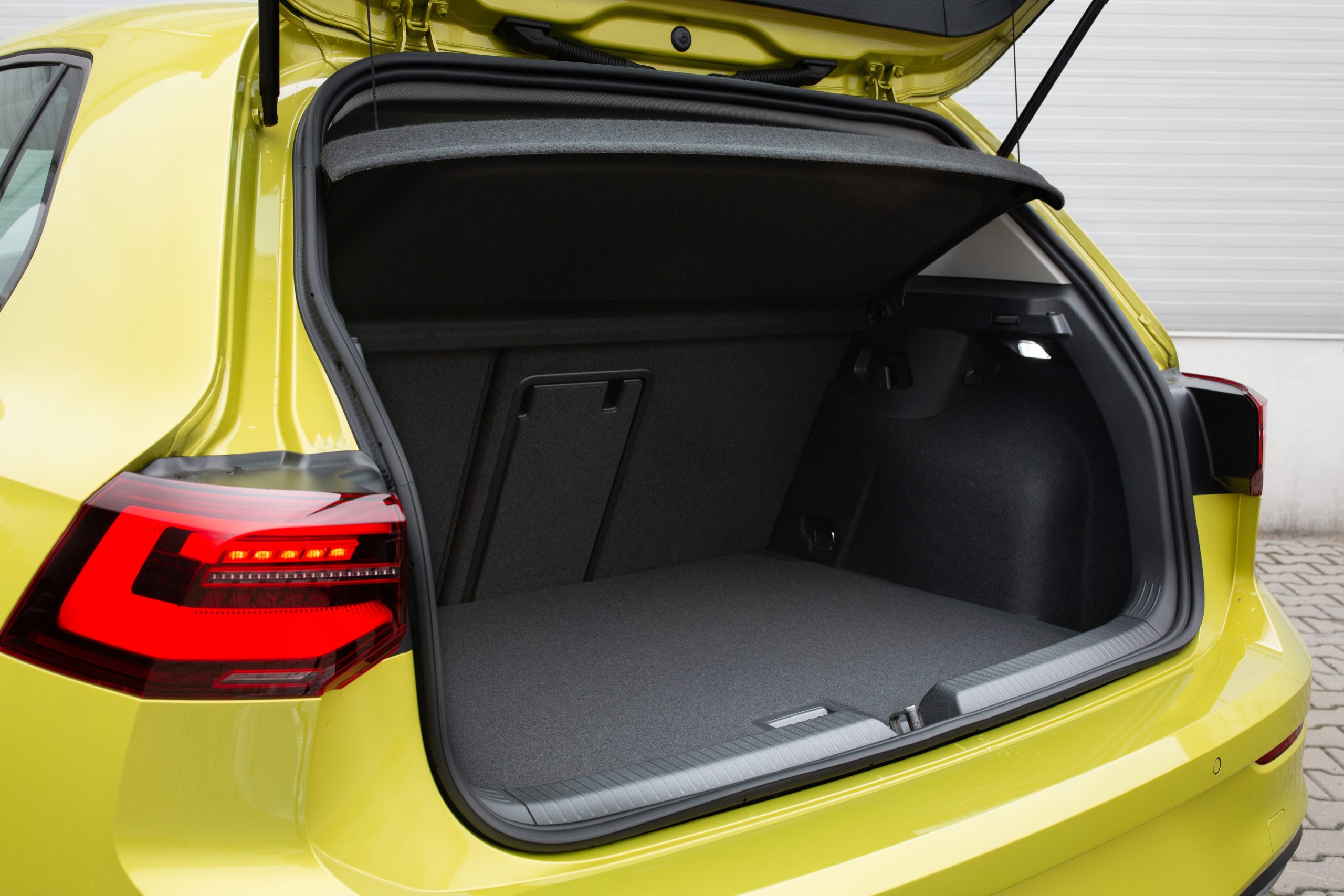 Modern hatchback car open trunk. Car boot is open