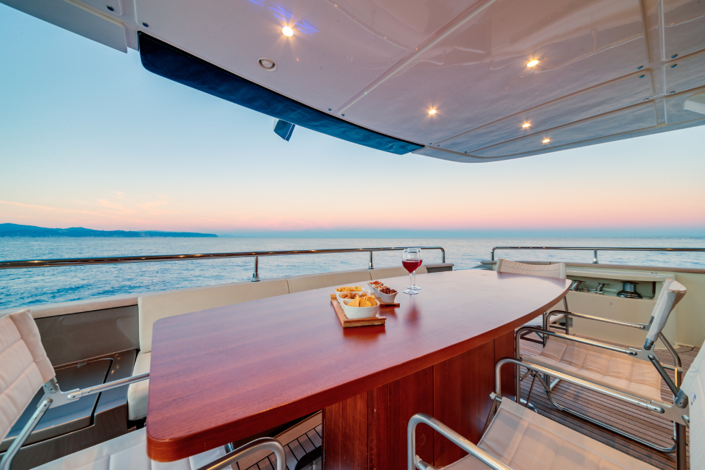 beautiful-shot-from-the-yacht-of-a-wooden-table-wi-2022-12-22-23-41-01-utc small